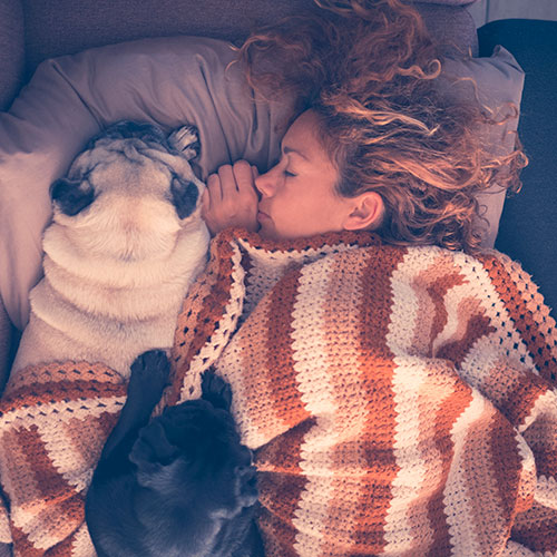 Woman and Dog Sleeping