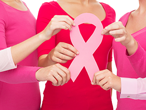 Women Wearing Pink Shirts Holding Pink Ribbon