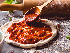 Pizza Dough with Red Sauce